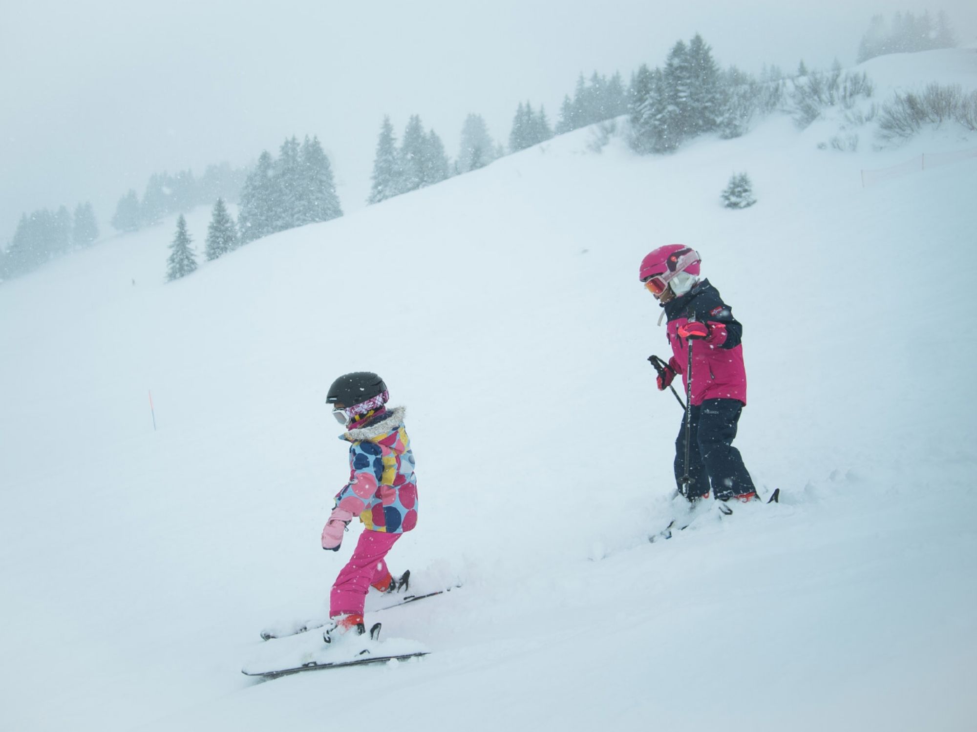 two-children-skiing-in-the-kids-club-champery