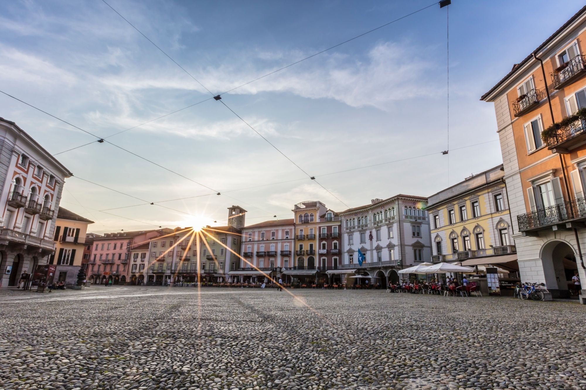 Locarno: Visit to Piazza Grande with a splendid view of the architecture and the sunset.