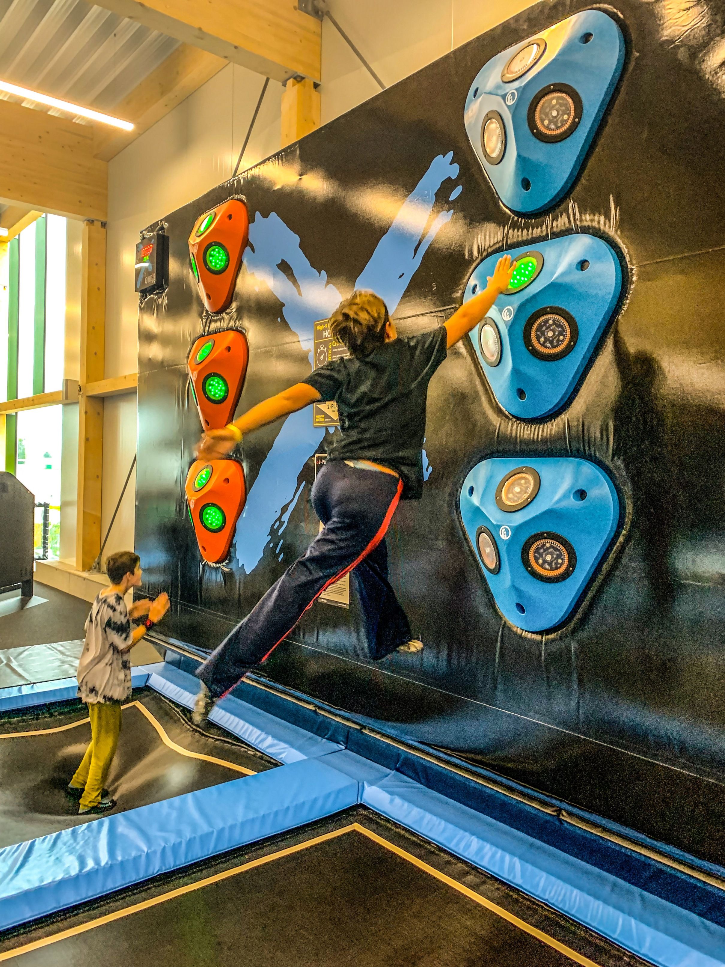 High-9 Duo: Interactive Climbing Wall in Xstream Park for Exciting Adventures and Team Activities.