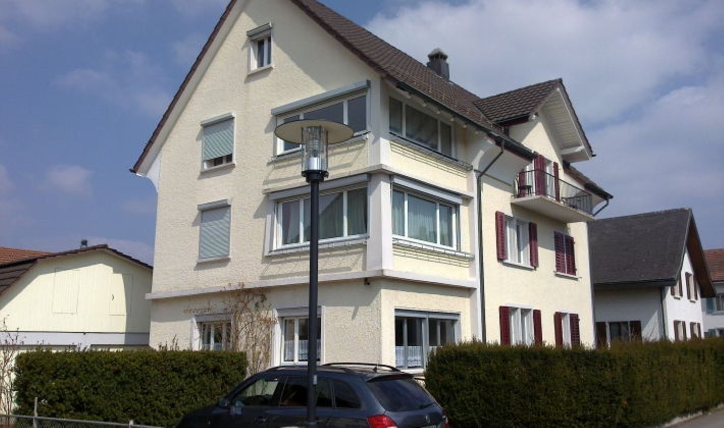 House in Lenzburg with well-maintained garden and large windows