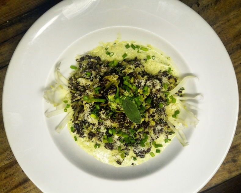 Sicilian food with cheese, herbs, and vegetables