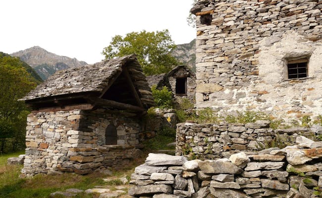 Traditional houses in the Verzascatal, idyllic nature and historical architecture in the mountains.