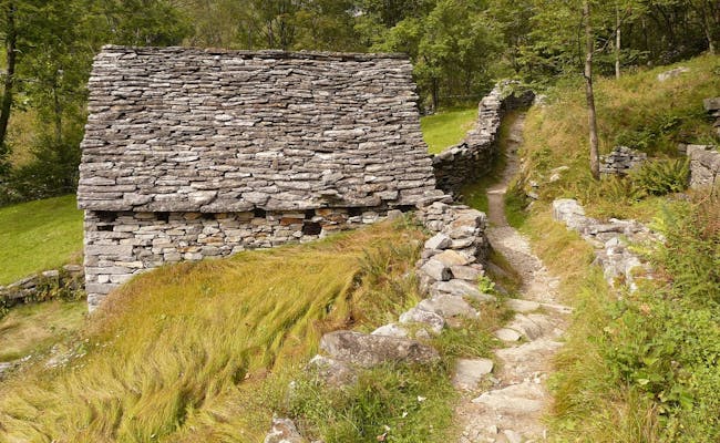 Traditional Houses in the Verzascatal: charming stone buildings in an idyllic landscape.