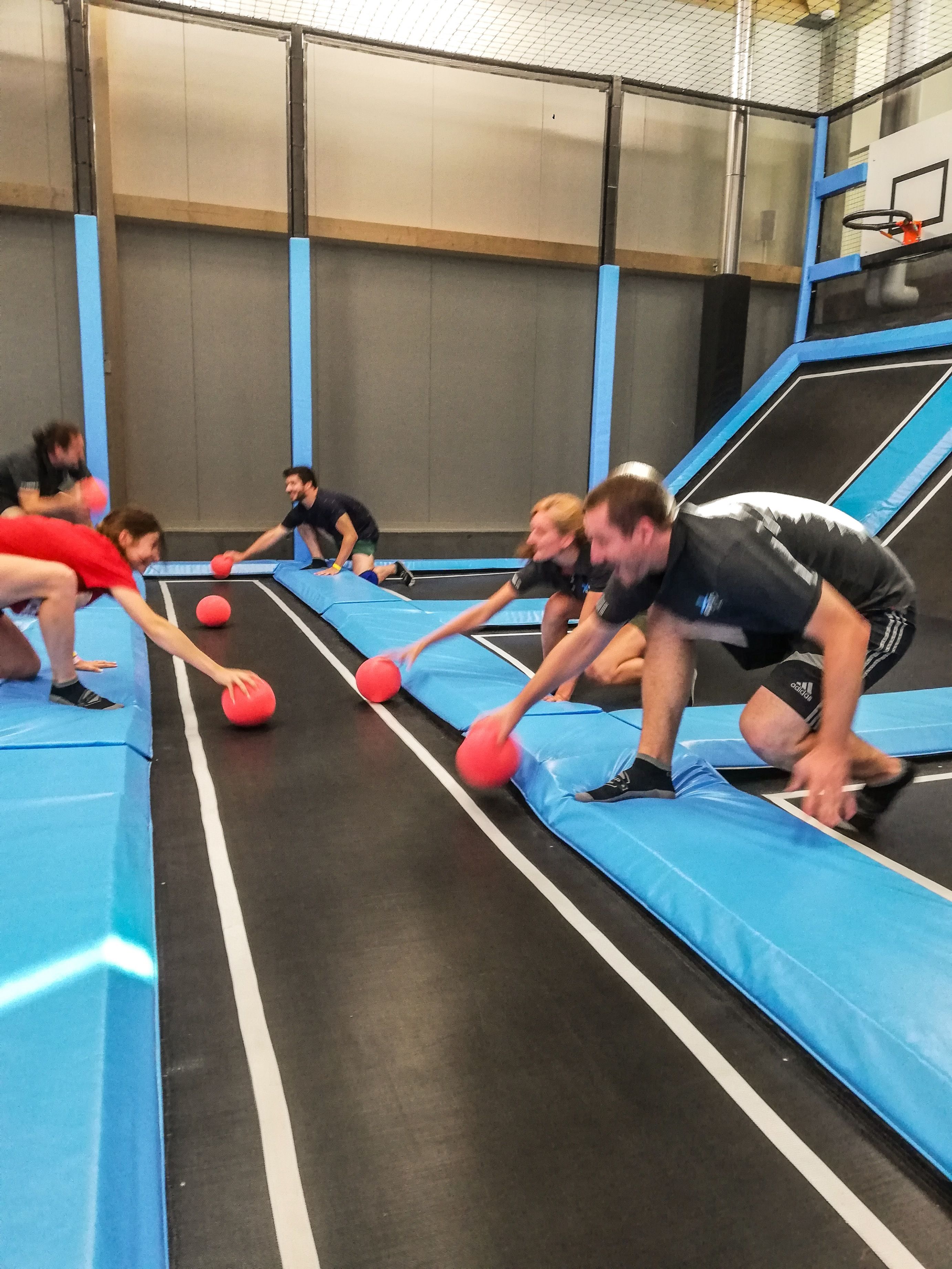 Dodgeball in Xstream Park: Fun and teamwork on trampolines in an adventure park.