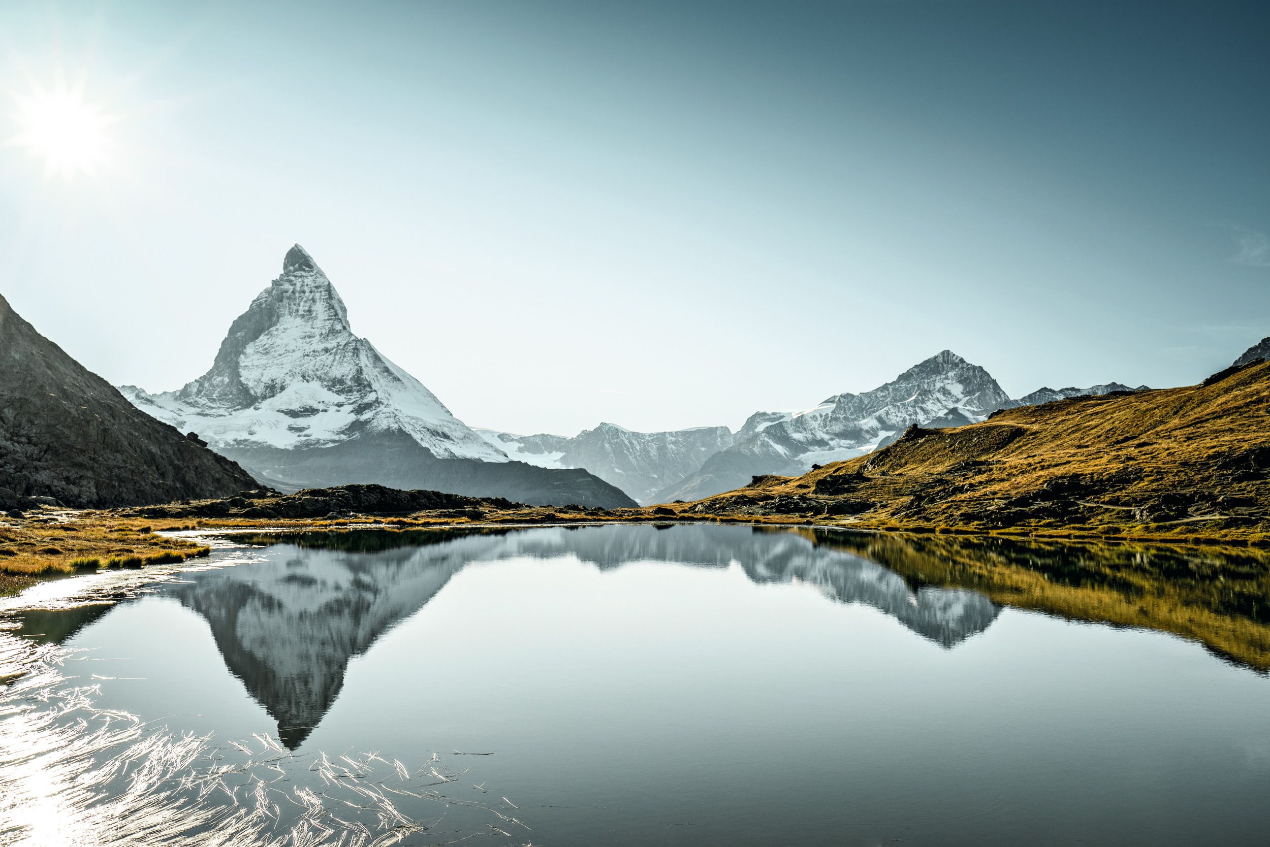 Riffelsee: Picturesque view of the Matterhorn and clear mountain reflection in summer.