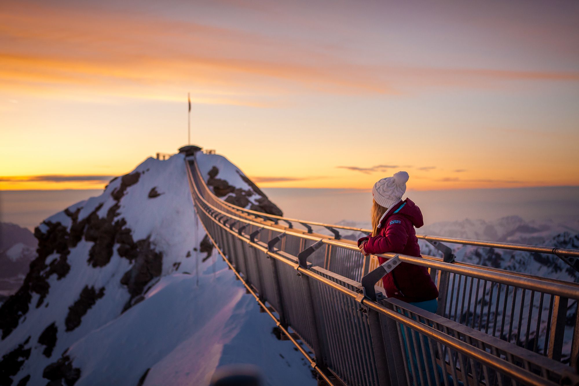 Glacier 3000: impressive Peak Walk with a view of the Alpine landscape in Switzerland in winter.