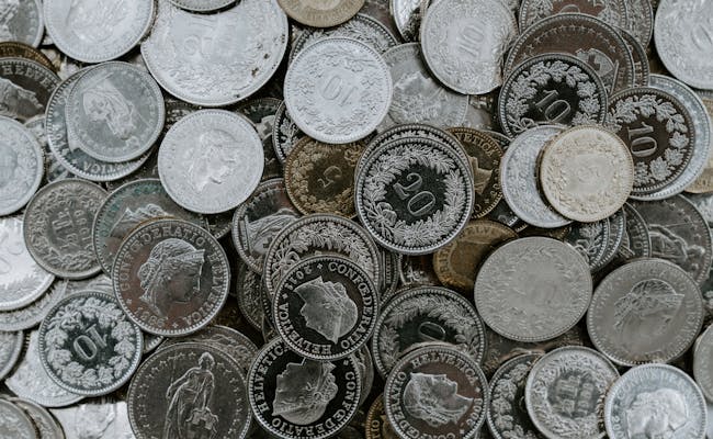Swiss coins (Photo: Unsplash Claudio Schwarz)