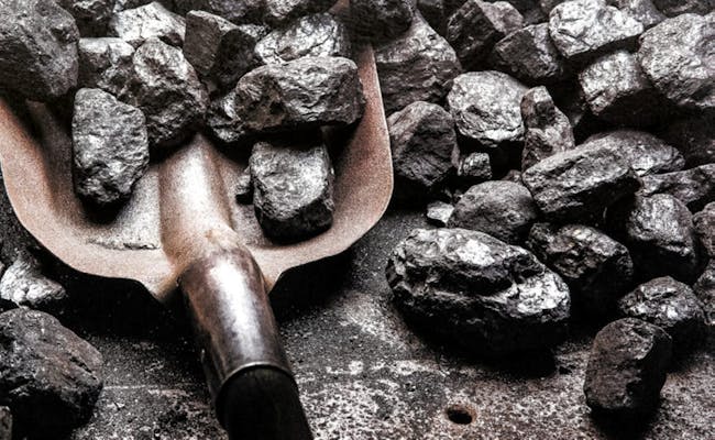 Steam Locomotive Fireman Course with Coal on Shovel in Workshop