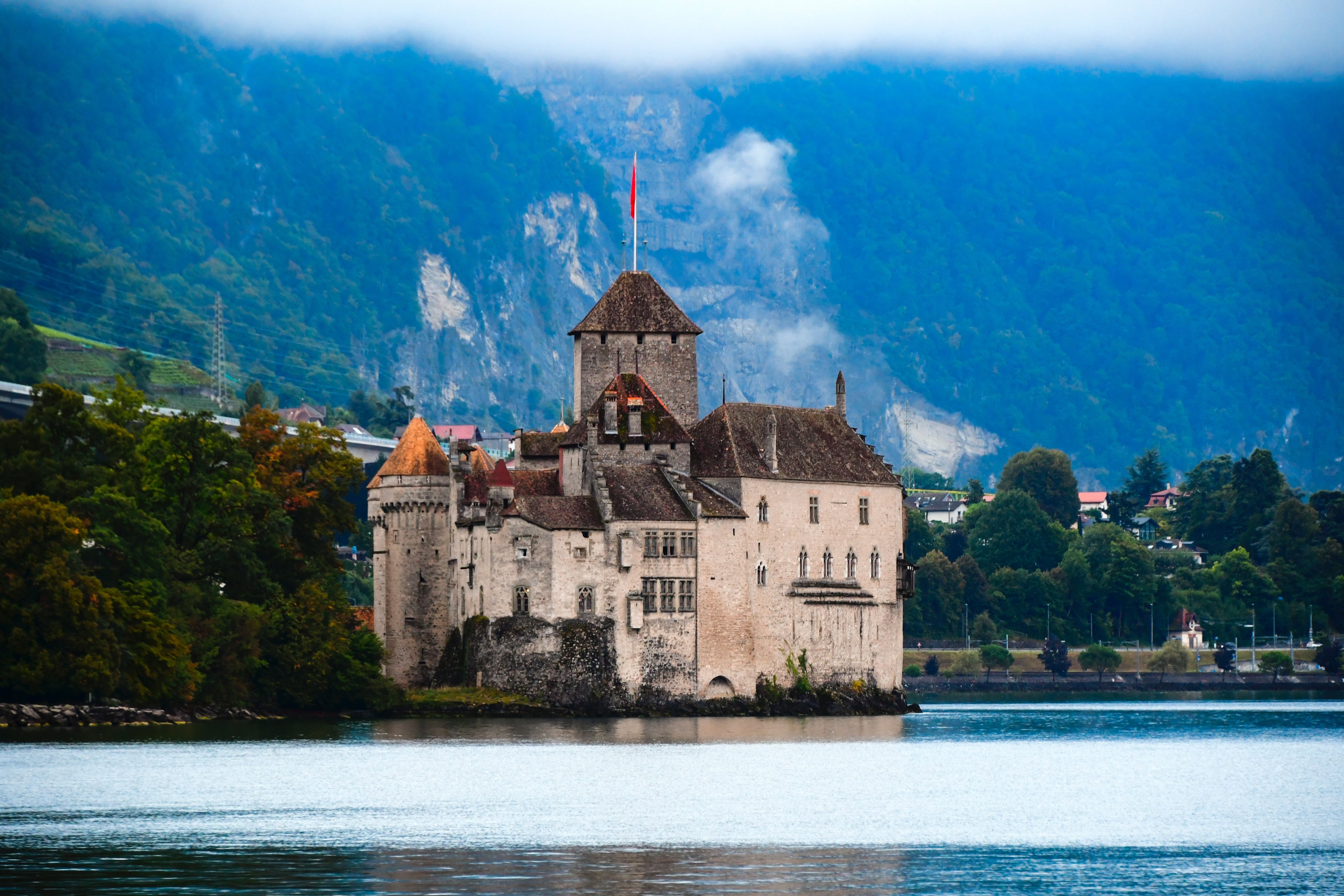 Chillon Castle on Lake Geneva: historic castle in Switzerland with beautiful natural panorama.