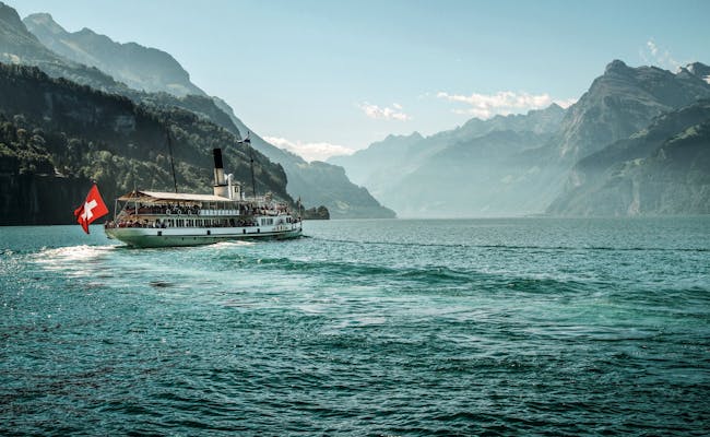 Boat trip on Lake Lucerne with views of the spectacular mountains and the clear water.