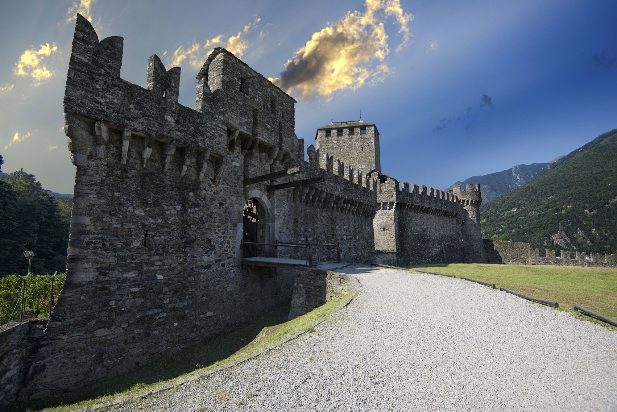 Montebello Castle with stone walls and surrounding landscape.