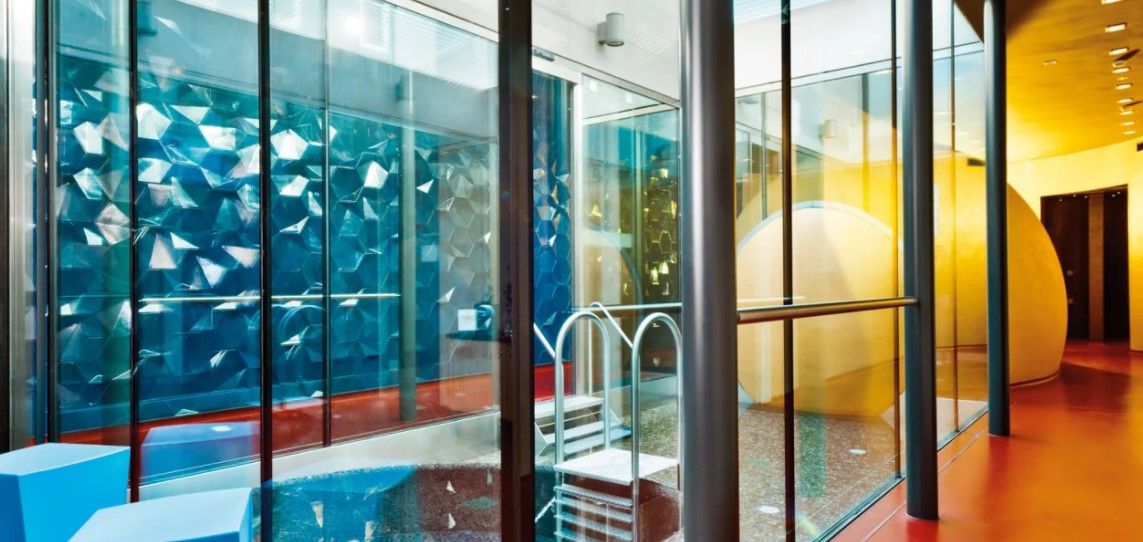 Aquarena Schinznach with a circular sauna landscape and swimming area.