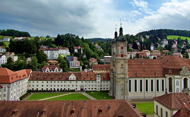 St. Gallen: magnificent city view with old buildings and green hills in the surroundings.