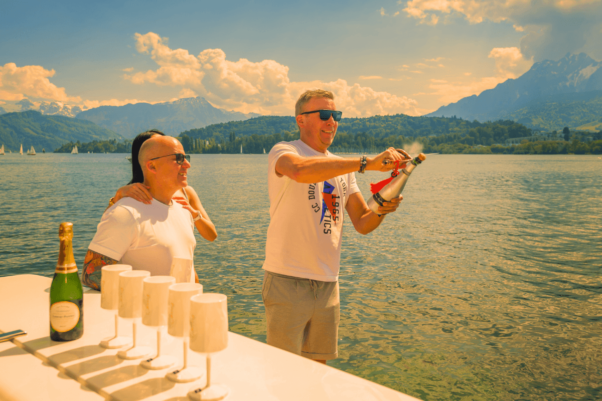 Champagne celebration at sunset by the lake, enjoy with friends in summer.