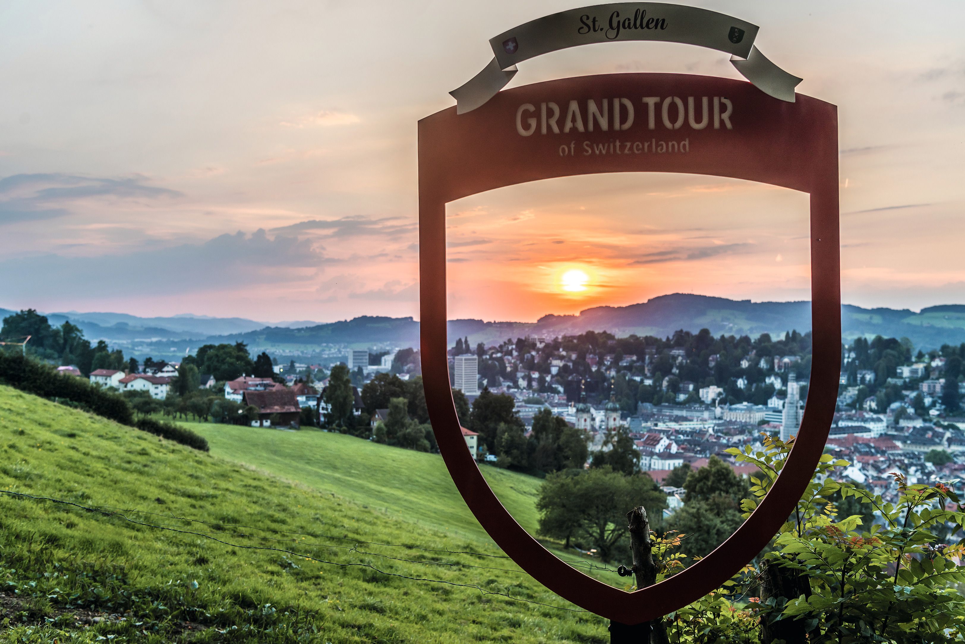 View over St. Gallen with a grand backdrop, sunset, Switzerland, experience nature.