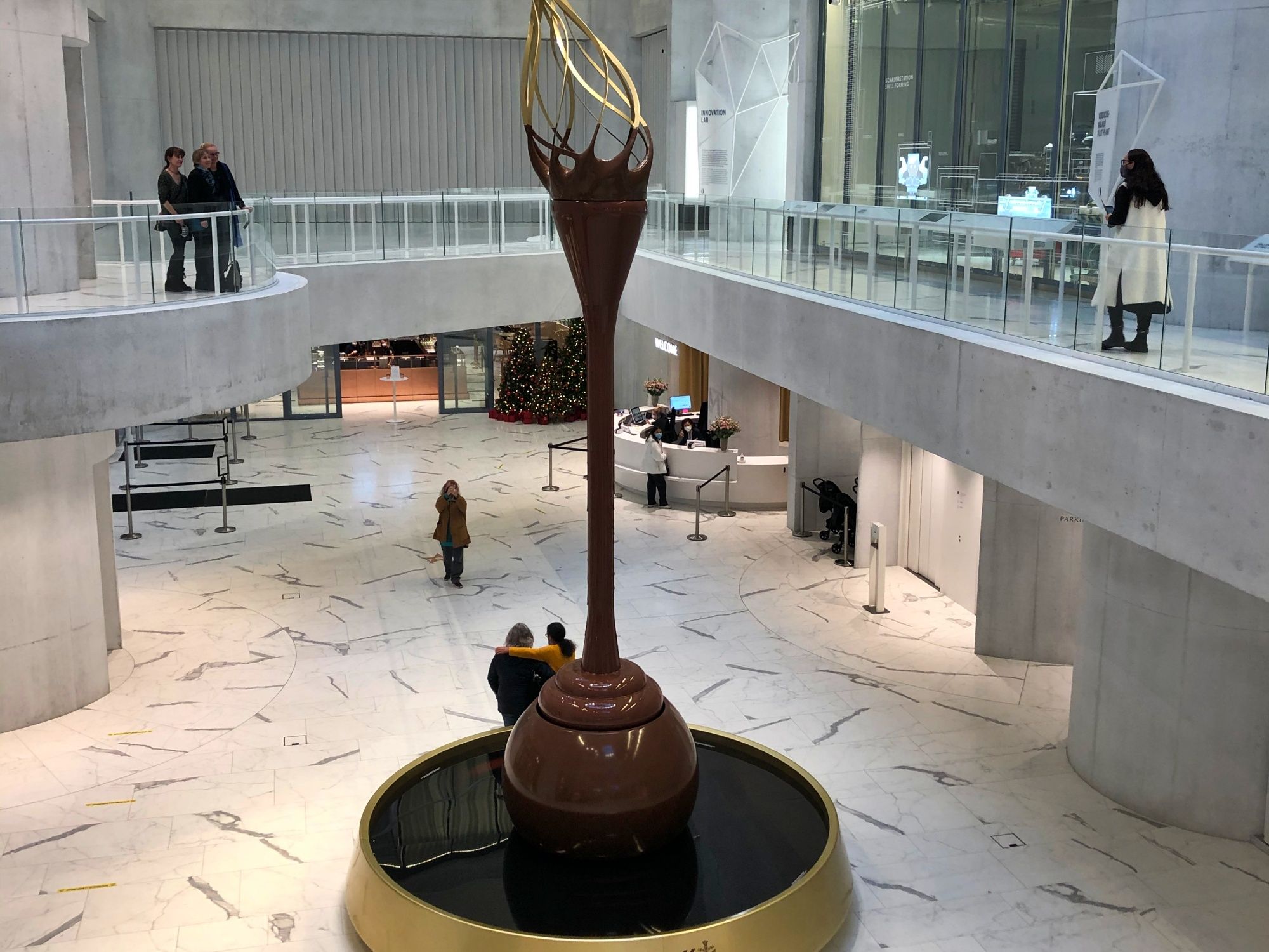 Lindt Home of Chocolate with large chocolate sculpture in the interior.