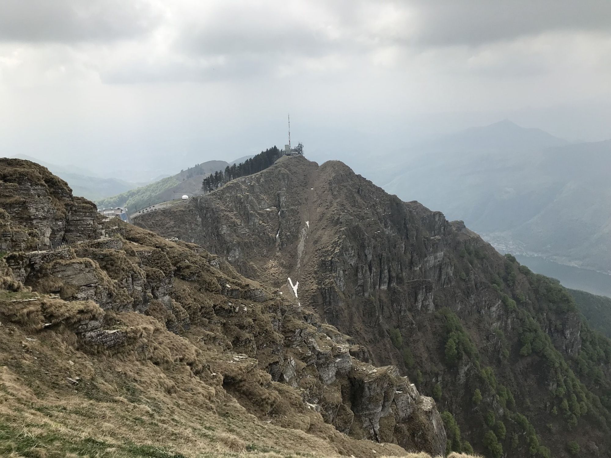 Monte Generoso: impressive mountain landscape with green meadows and rocky peaks in nature.
