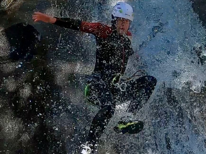 Iragna Canyoning: Experience an exciting adventure in the cool waters of Switzerland.