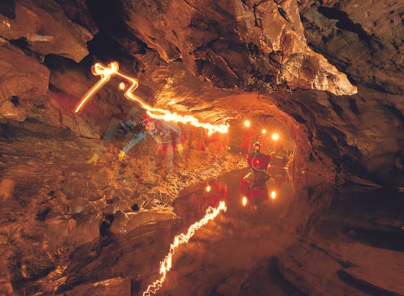 Glitter gate in Hölloch, shimmering light reflections on water