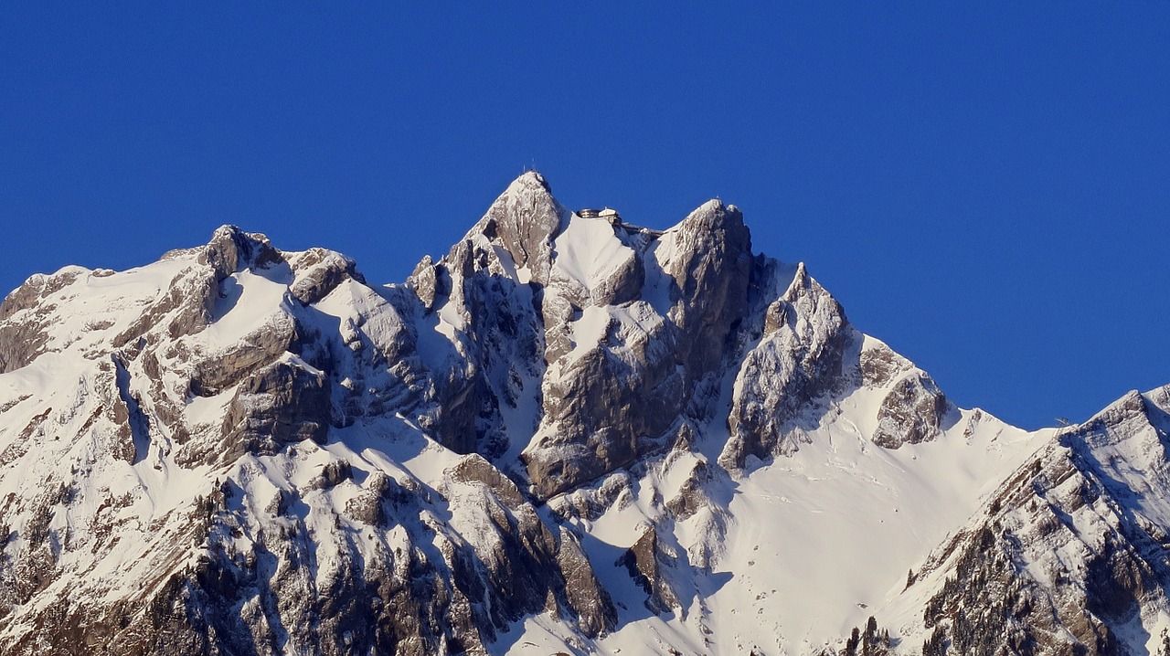 Side view of Pilatus with snow-covered peak under clear sky