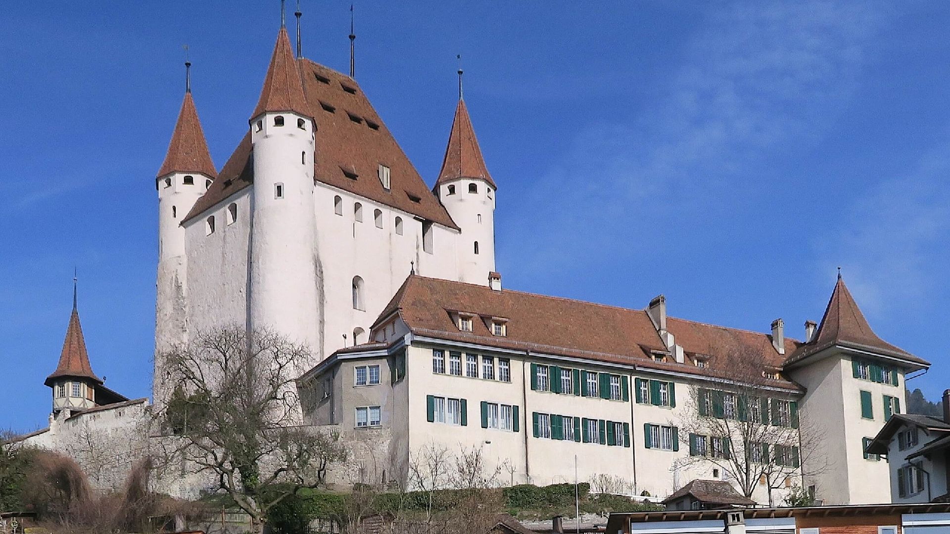 Guided Tour of Thun Castle with a View of the Architecture, Towers, and Surroundings