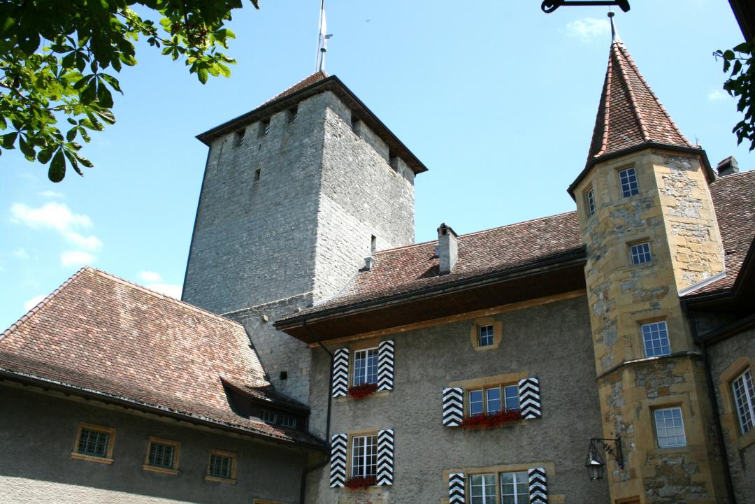 Castle tower in Murten, historic building, blue sky