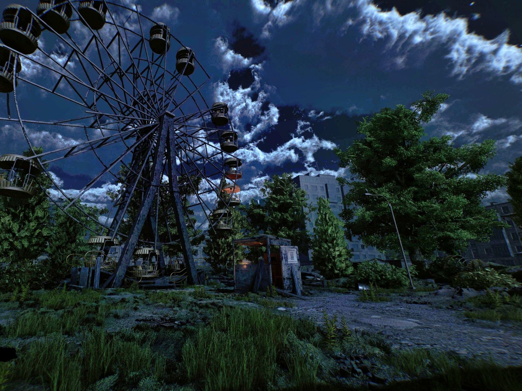 VR Tschernobyl: Entdecke die faszinierende Ruine des Vergnügungsparks bei Nacht in der Natur.