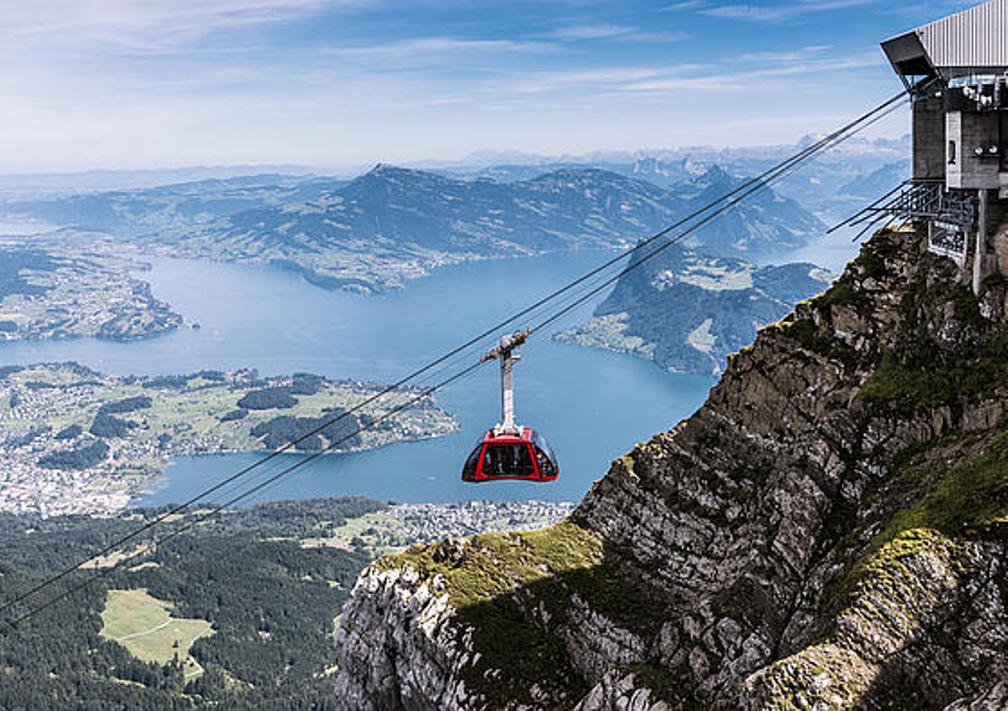 Pilatus Cable Car Glides Over Lake Lucerne and Mountains