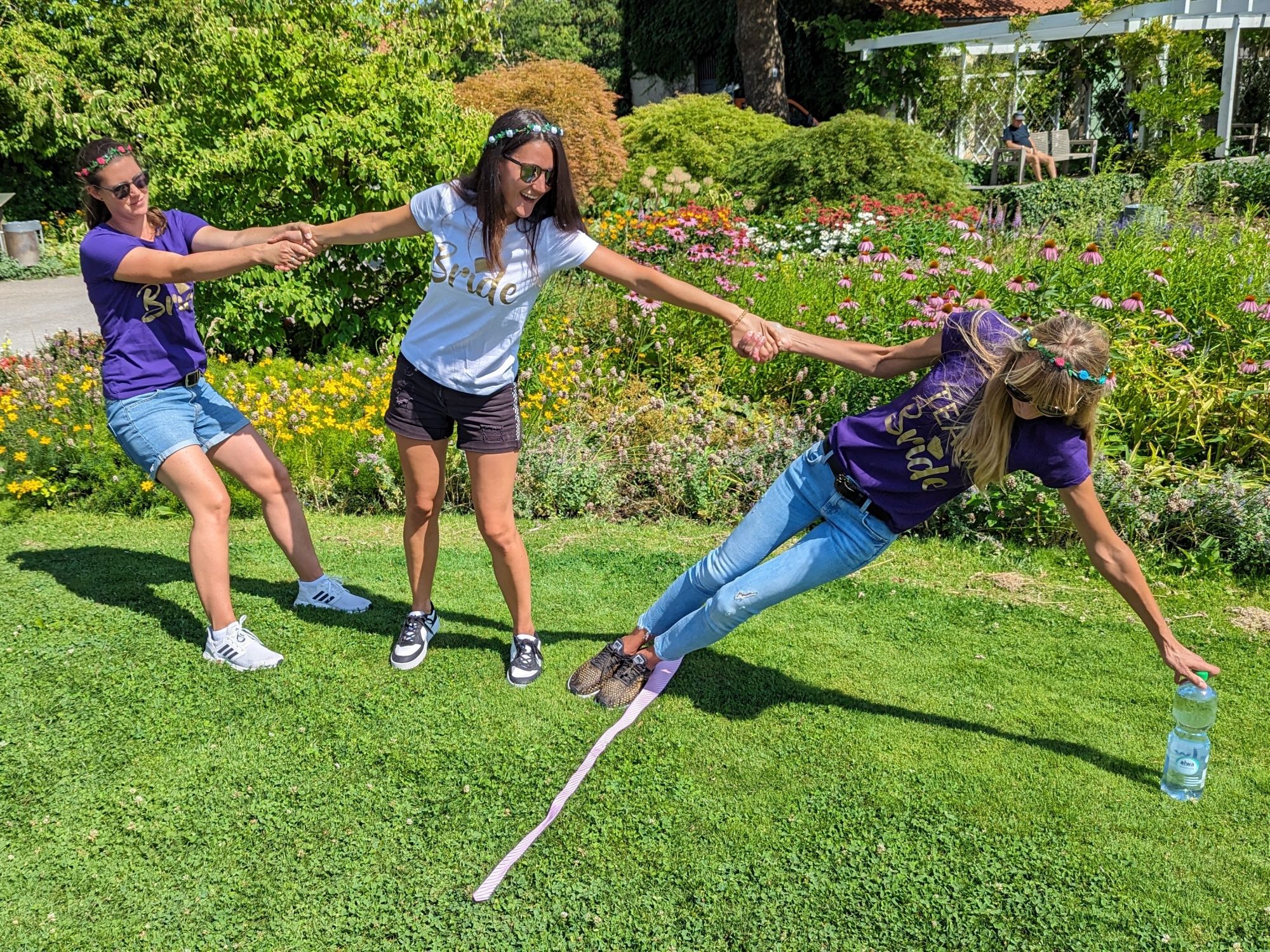 Beat the Bride: Festive Outdoor Activity for Groups in Summer in the Garden with Flowers and Laughter.