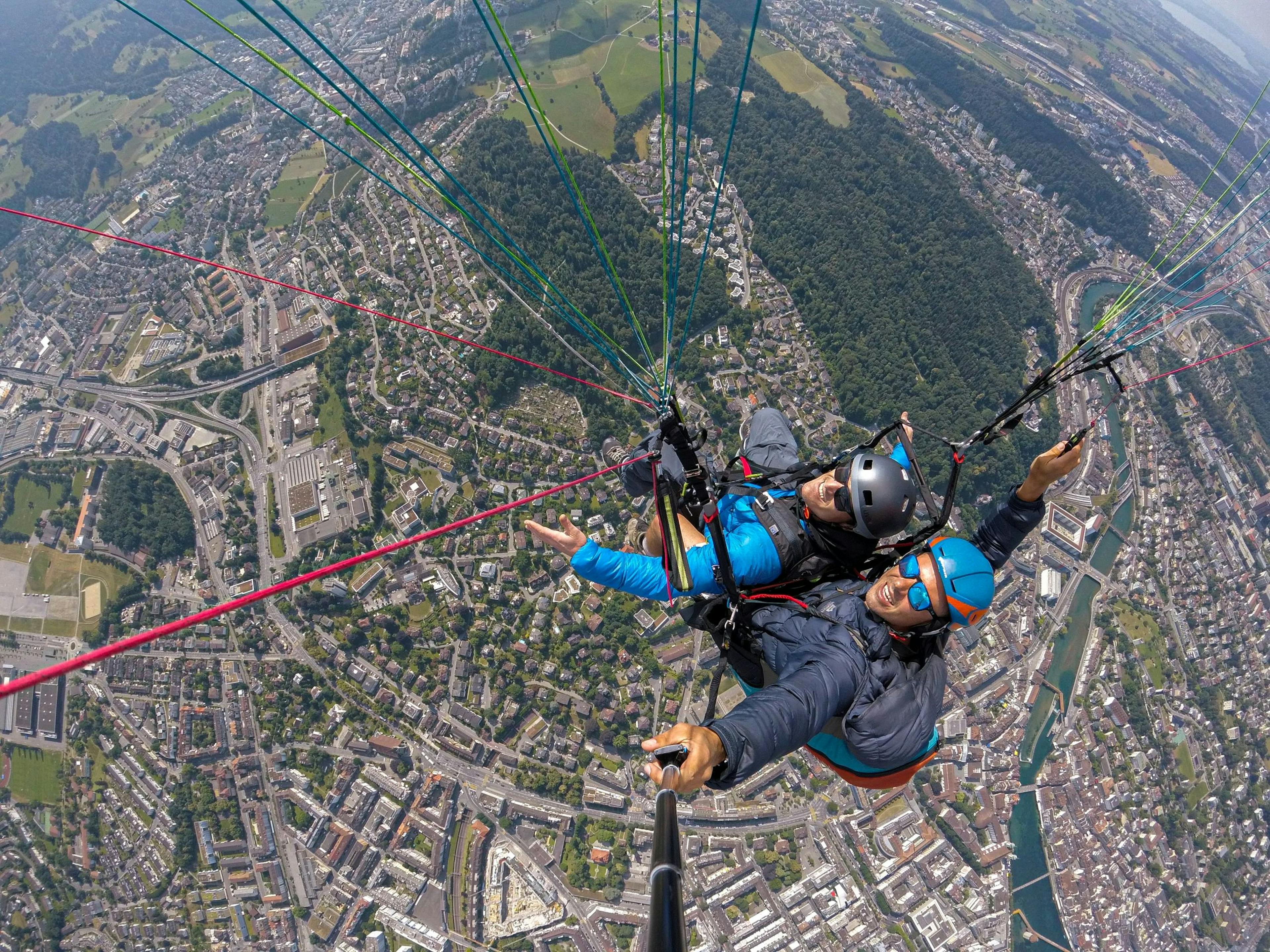 Paragliding over Zurich with a view of the city