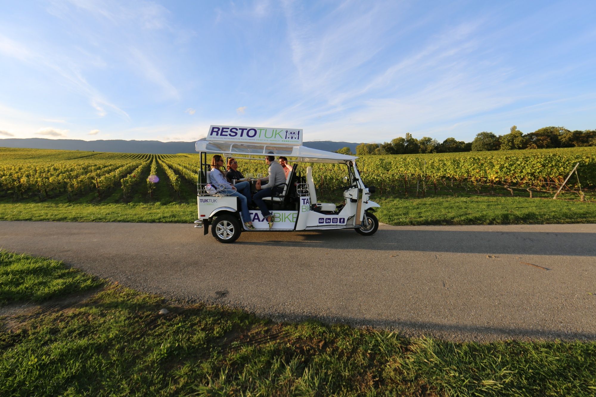 Tuktuk wine tour through Geneva vineyards