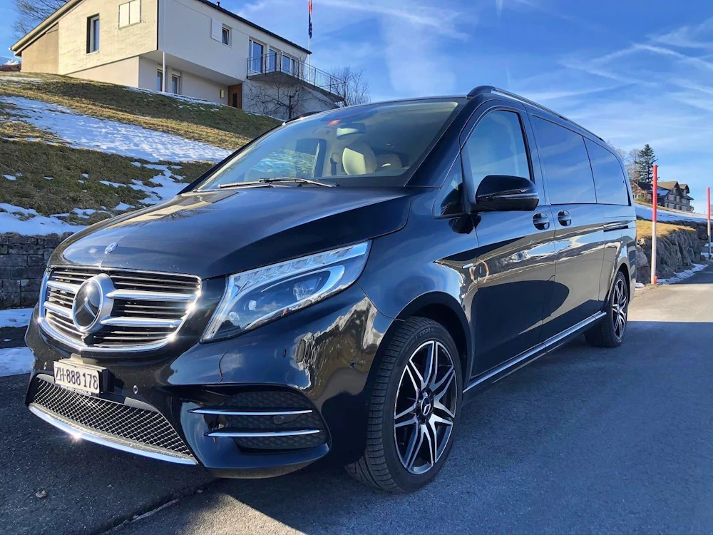 Geneva transfer to Crans Montana with Mercedes bus in winter