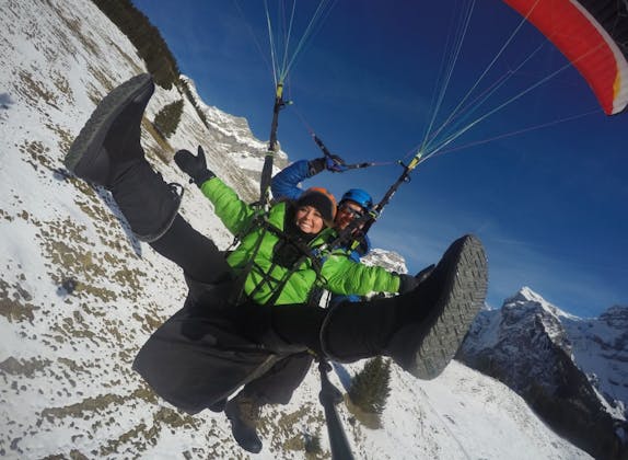 Paragliding in Lucerne, experience a tandem thermal flight over the winter landscape.