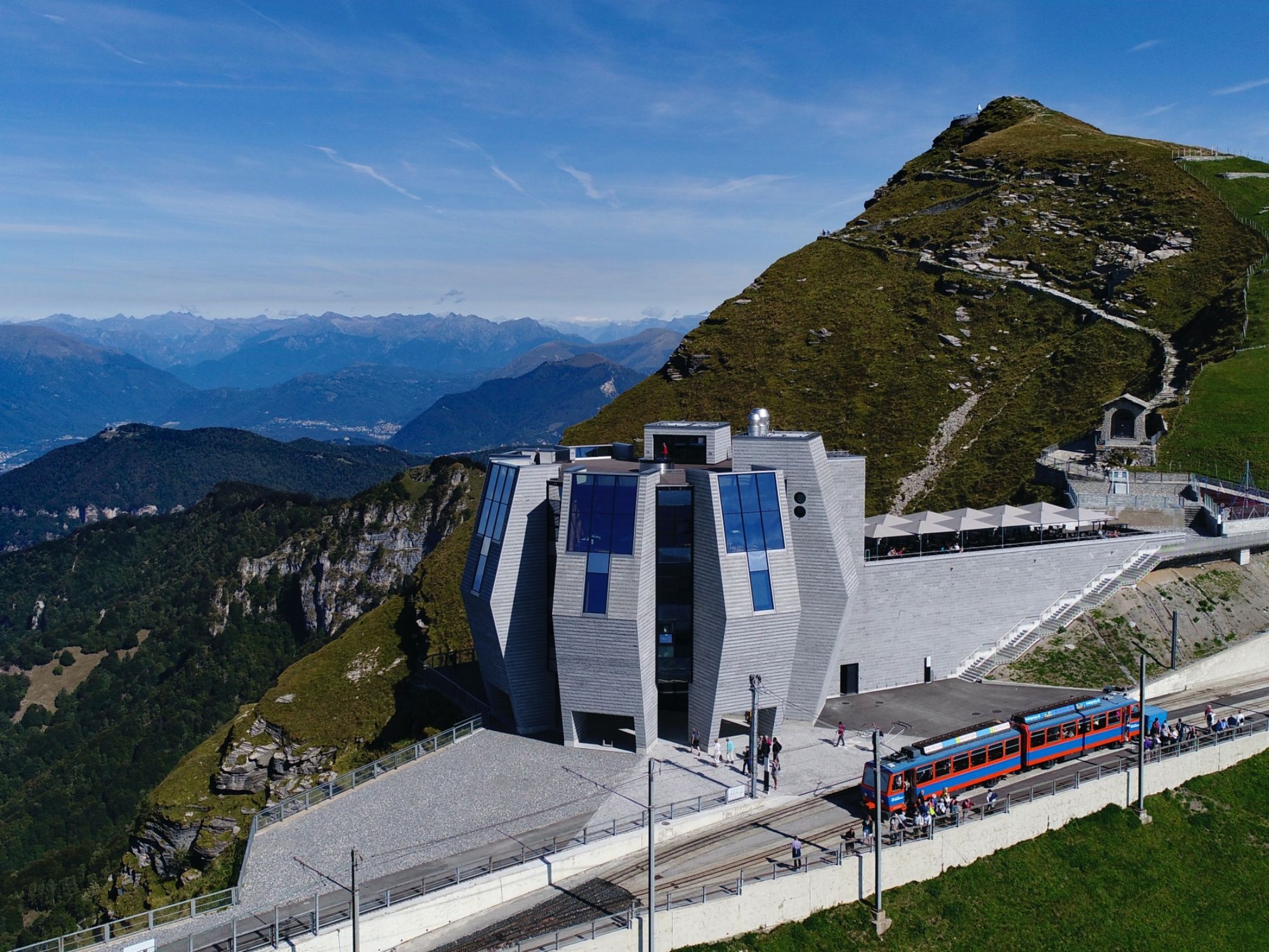 Monte Generoso: stunning view and stone rose over the Alps, ideal for nature lovers.
