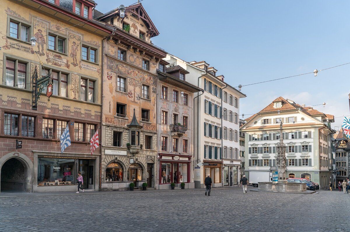 Lucerne Old Town with historic buildings and market stalls.