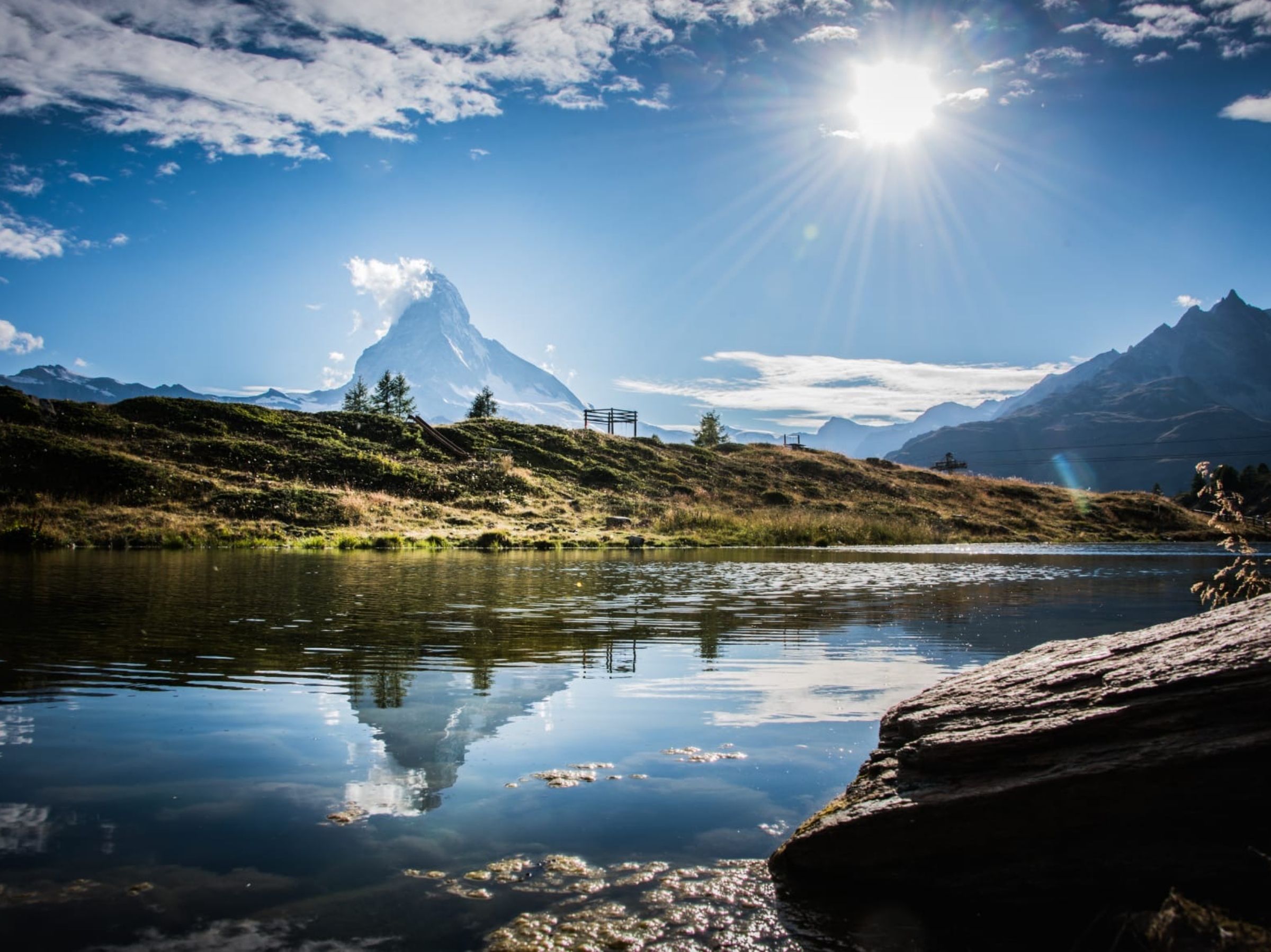 Matterhorn: guided hike with reflection in Zermatt lake, natural beauty and mountain landscape