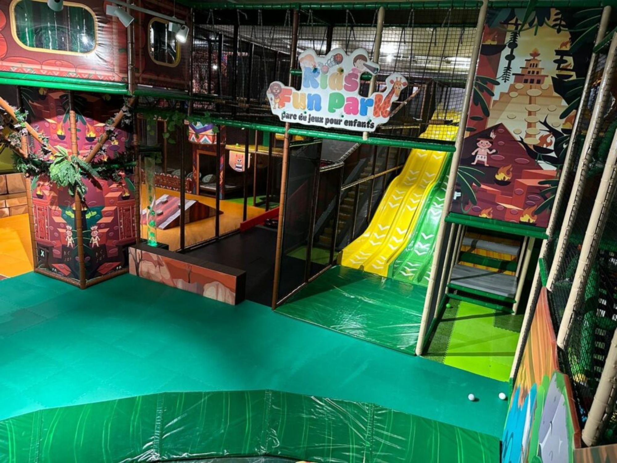 Kids Fun Park: Play area for children with slides and playground equipment in Sion.