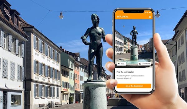 Scavenger hunt smartphone fountain statue