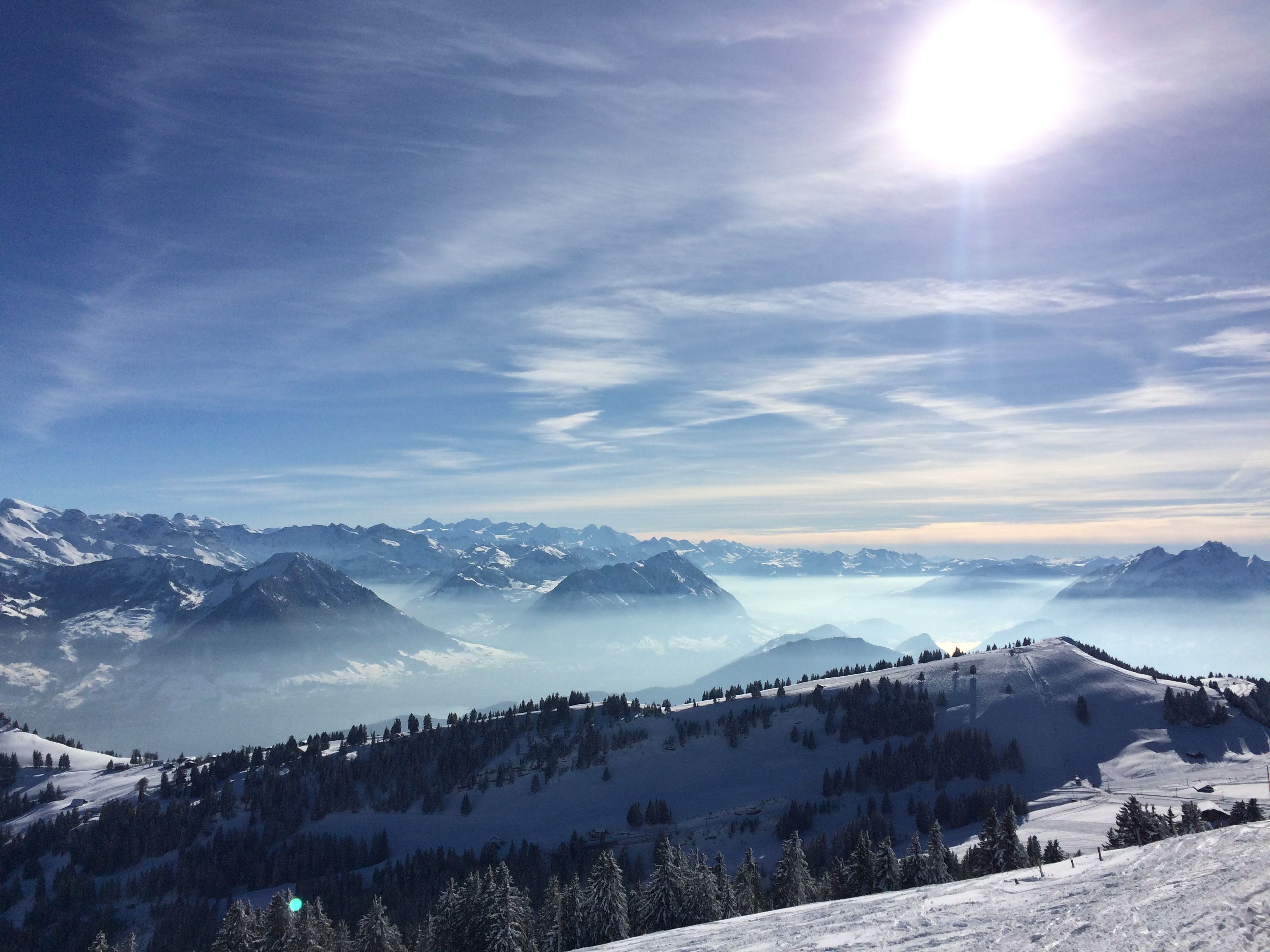 Rigi: spectacular view of snow-covered mountains and valleys in Switzerland in winter.