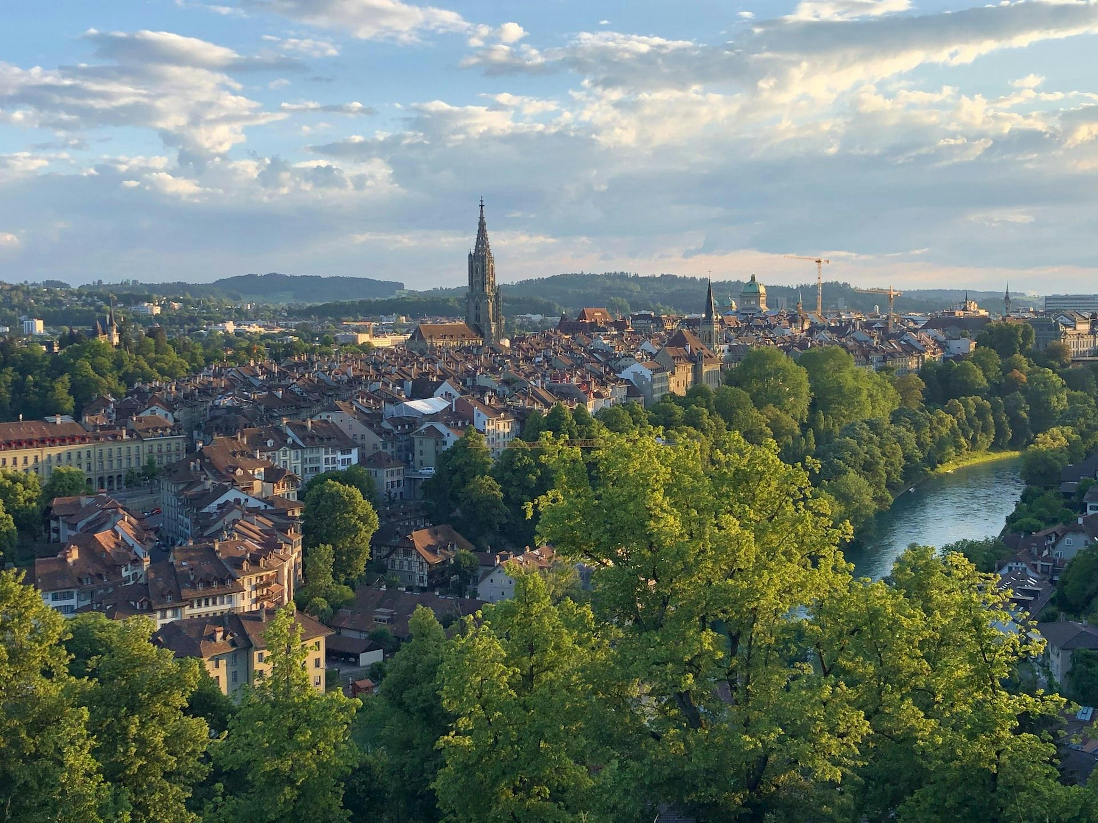 Bern: City view of Bern with historic buildings and river.