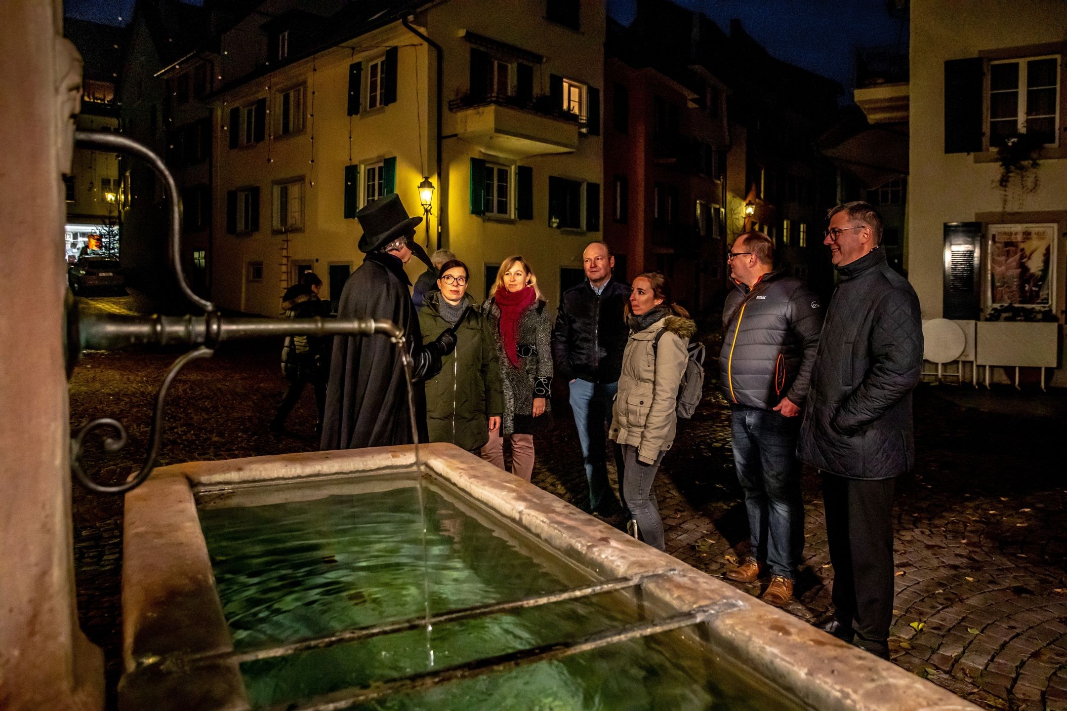 Pest Fountain at Night with City Tour in Rheinfelden
